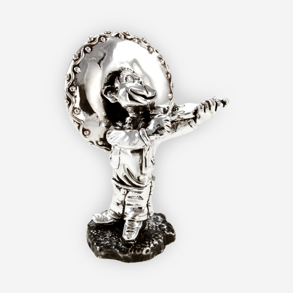 ”Cantinflas Mariachi ” silver sculpture has an oxidize finish and is crafted with electroforming techniques and dipped in sterling silver.