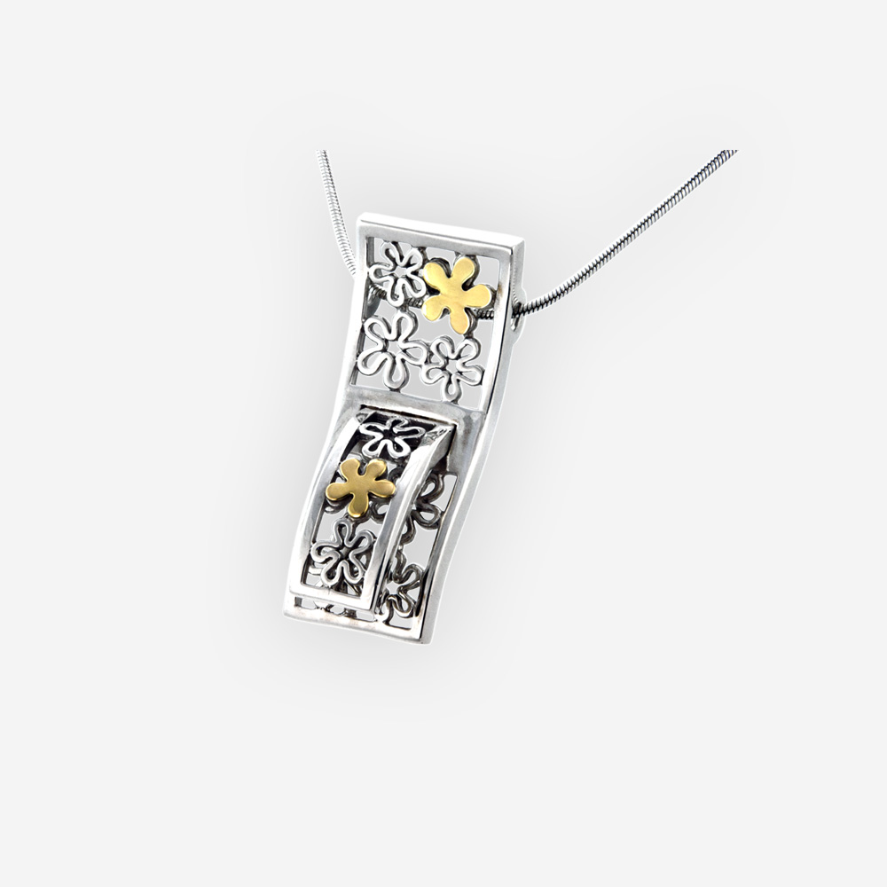 Two-tone openwork flower necklace crafted in 925 sterling silver and 14k gold on a silver chain.